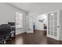 Bright home office featuring hardwood floors and ample natural light at 323 Oak Branch Trl, Garner, NC 27529