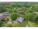 Aerial view of home in a lush, green neighborhood close to Whitley Park at 406 N Wakefield St, Zebulon, NC 27597