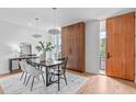 Bright dining room with modern light fixtures, wood accents, and stylish decor at 501 S Bloodworth St # 101, Raleigh, NC 27601