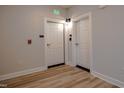Hallway offers access to unit door, stairwell, and safety features at 800 Gathering Park Cir # 204, Cary, NC 27519