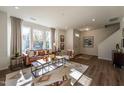 Inviting living room with ample natural light, stylish furniture, and hardwood flooring at Lot 8 Cooper St, Sanford, NC 27330