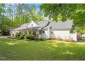 Charming single-Gathering home featuring a two-car garage and manicured lawn at 2008 Elizabeth Ct, Clayton, NC 27520