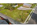 Expansive green yard featuring an outdoor seating area and a shed at 212 Orange St, Oxford, NC 27565