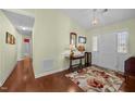 Bright entryway featuring hardwood floors, decorative furnishings, and access to other rooms at 2424 Cambridge Rd, Burlington, NC 27215