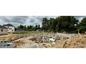 New home under construction with concrete blocks; residential development underway at 37 Shoreline Dr, Lillington, NC 27546
