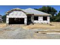 New construction home featuring the exterior prior to the installation of siding and brick at 37 Shoreline Dr, Lillington, NC 27546