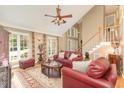 Bright and airy living room with tall ceilings and a staircase at 53 Westridge Dr, Durham, NC 27713