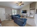 Spacious living room featuring vaulted ceilings, comfortable seating and open concept design at 112 Tillburg Ln, Hurdle Mills, NC 27541