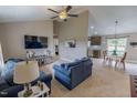 Inviting living room featuring vaulted ceilings, comfortable seating, and lots of natural light at 112 Tillburg Ln, Hurdle Mills, NC 27541