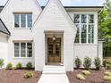 Inviting front entrance with double doors and manicured landscaping at 40 Ridgeline Ct # 10, Pittsboro, NC 27312
