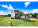 Well-maintained two-story home with verdant lawn and a cozy, inviting atmosphere at 47 Peduncle St, Selma, NC 27576