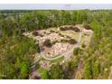 A community park with winding trails, rock formations, and mature trees offers a serene outdoor space at 638 Boulder Point Dr, Chapel Hill, NC 27516