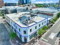 Street-level view of charming building with rooftop terrace in a vibrant neighborhood at 101 Morris St # D, Durham, NC 27701