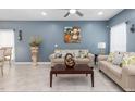 Cozy living room with a comfortable seating arrangement and stylish decor at 1220 Marbank St, Wake Forest, NC 27587