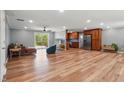 Bright living area with wood floors, modern appliances, and an open floor plan at 3540 Sellars Rd, Mebane, NC 27302