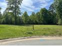 Cleared lot offers a scenic view with mature trees in a desirable location at 4002 Dublin Ct, Burlington, NC 27215