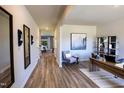 Bright home office with wood floors, stylish desk, and modern decor, filled with natural light at 1139 Winding Spring Dr, Mebane, NC 27302