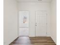 Fresh, bright entryway boasting durable flooring and a glimpse into the sunlit living area at 149 Gladstone Loop, Clayton, NC 27520