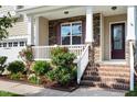 Charming two-story home with brick and siding exterior at 1910 Morehead Hill Ct, Durham, NC 27703