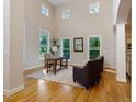 Bright office with hardwood floors, natural light, and comfortable seating at 211 Page St, Morrisville, NC 27560