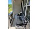 Inviting front porch with a stylish bench, perfect for enjoying the outdoors at 236 Bragg Ln, Hurdle Mills, NC 27541