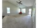 Bright living room featuring vaulted ceilings and ample natural light at 236 Bragg Ln, Hurdle Mills, NC 27541