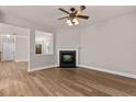 Bright living room with wood floors and fireplace at 3002 Remington Oaks Cir, Cary, NC 27519
