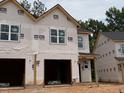New construction of a two-story home, showing the exterior during the building process at 33 Calluna Dr, Clayton, NC 27520