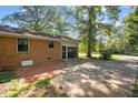 Attached garage and a brick-paved section with a paved driveway at 401 Crestview Dr Dr, Durham, NC 27712