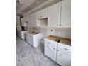 Unfinished kitchen area featuring white cabinets offering ample storage at 79 Mildred Dr, Broadway, NC 27505