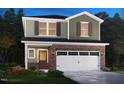 Charming two-story home with brick facade and attached garage, perfect for modern living at 801 Ottawa Dr, Garner, NC 27529