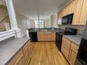 Well-equipped kitchen with modern appliances, light wood cabinetry, and countertop, providing ample storage and prep space at 113 Conner Dv # 106, Chapel Hill, NC 27514