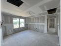 Bright room with a large window offers great natural light; ready for customization at 183 Pecan Valley Way, Four Oaks, NC 27524