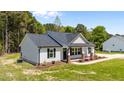 Attractive single-story home featuring a well-kept lawn and charming curb appeal at 1914 Jack Rd, Clayton, NC 27520