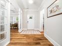 Welcoming foyer with hardwood floors and an open view to the living area at 1121 Coast Grade St, Wake Forest, NC 27587