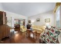 Spacious living room with hardwood floors, traditional decor, and abundant natural light at 1204 Caribou Xing, Durham, NC 27713