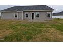 The backyard has an open patio and green lawn at 1590 Pecan Drive # 45, Nashville, NC 27856