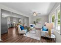 Bright and spacious living room with hardwood floors, modern furniture, and an open layout at 1734 Stage Rd, Durham, NC 27703