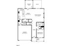 Detailed first-floor floor plan showing kitchen, dining, Gathering room, and garage layout at 215 Macon Lake Drive # 23, Apex, NC 27523