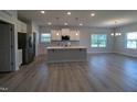 Bright kitchen featuring stainless steel appliances, island, and lots of natural light at 600 Sweet Potato Lane # 38, Nashville, NC 27856