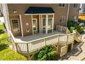 Close-up of the wooden deck, showcasing its size and access to the backyard at 10320 Crisp Dr, Raleigh, NC 27614