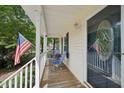 Inviting front porch with comfortable seating, perfect for relaxing and enjoying the outdoors at 300 Hutchins Dr, Garner, NC 27529