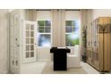 Bright office space with dual windows, modern desk, neutral palette, and decorative cabinet at 548 Morning Light Dr, Angier, NC 27501