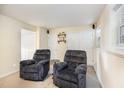 Cozy finished basement featuring plush seating and ample storage space at 5504 Crabtree Park Ct, Raleigh, NC 27612