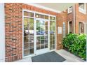 Close up view of the front door to the condo building at 8231 Allyns Landing Way # 302, Raleigh, NC 27615