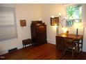 Comfortable bedroom with hardwood floors, natural light, and vintage furniture at 1013 Green St, Durham, NC 27701
