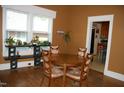 Bright dining room features hardwood floors, natural light, and traditional-style furniture at 1013 Green St, Durham, NC 27701