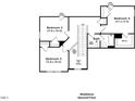 Upstairs floor plan with multiple bedrooms with a bathroom and an open-to-below staircase at 1099 Channel Drop Lp, Zebulon, NC 27597