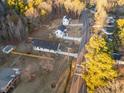 An aerial view showing the location of the house, nearby properties, and neighborhood streets at 1101 Ridge Rd, Roxboro, NC 27573
