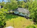 Aerial view of a home with a large, grassy backyard at 301 N West St St, Cary, NC 27513